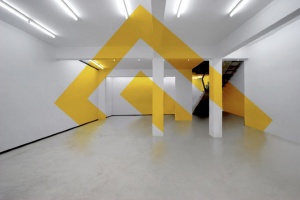Anamorphic Wall painting in yellow colour used by architect for interiors.