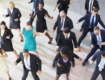 Employees dancing and being stress-free at work.